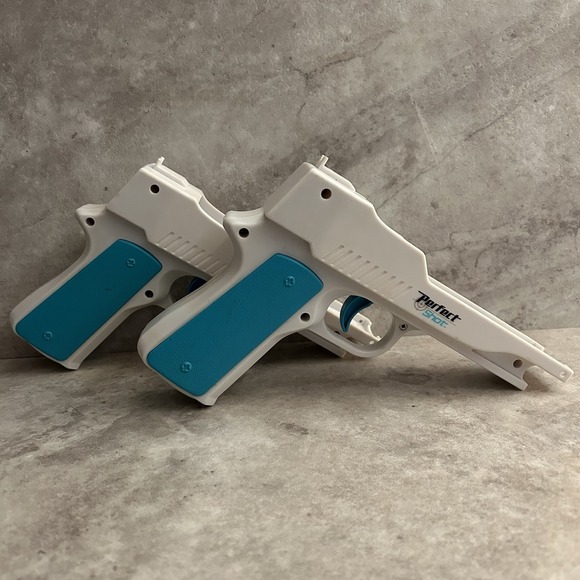 Nyko Technologies Other - Nyko Perfect Shot Gun Controller White Blue Orange for Nintendo Wii Remote Pair